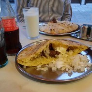 A serving of čevapi, a common Bosnian dish if meat sausages in bread