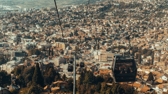 The Sarajevo - Trebević cable car with the city of Sarajevo in the background