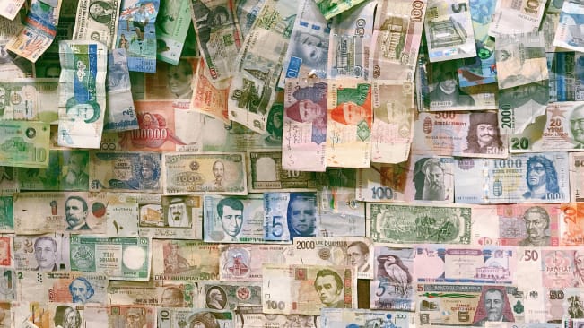 A board of many different types of currency