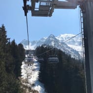 Ski lift at Jahorina in Bosnia and Herzegovina with mountain peaks in the background